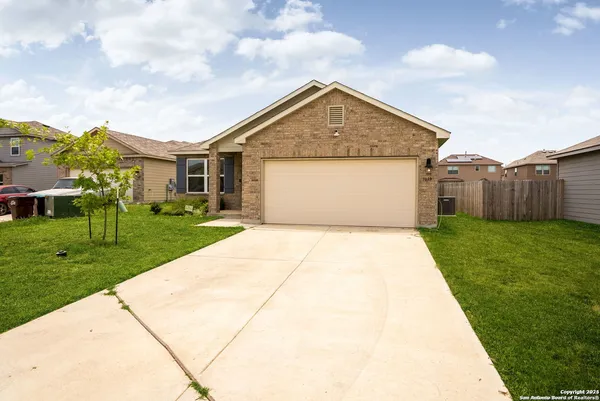 a front view of house with yard