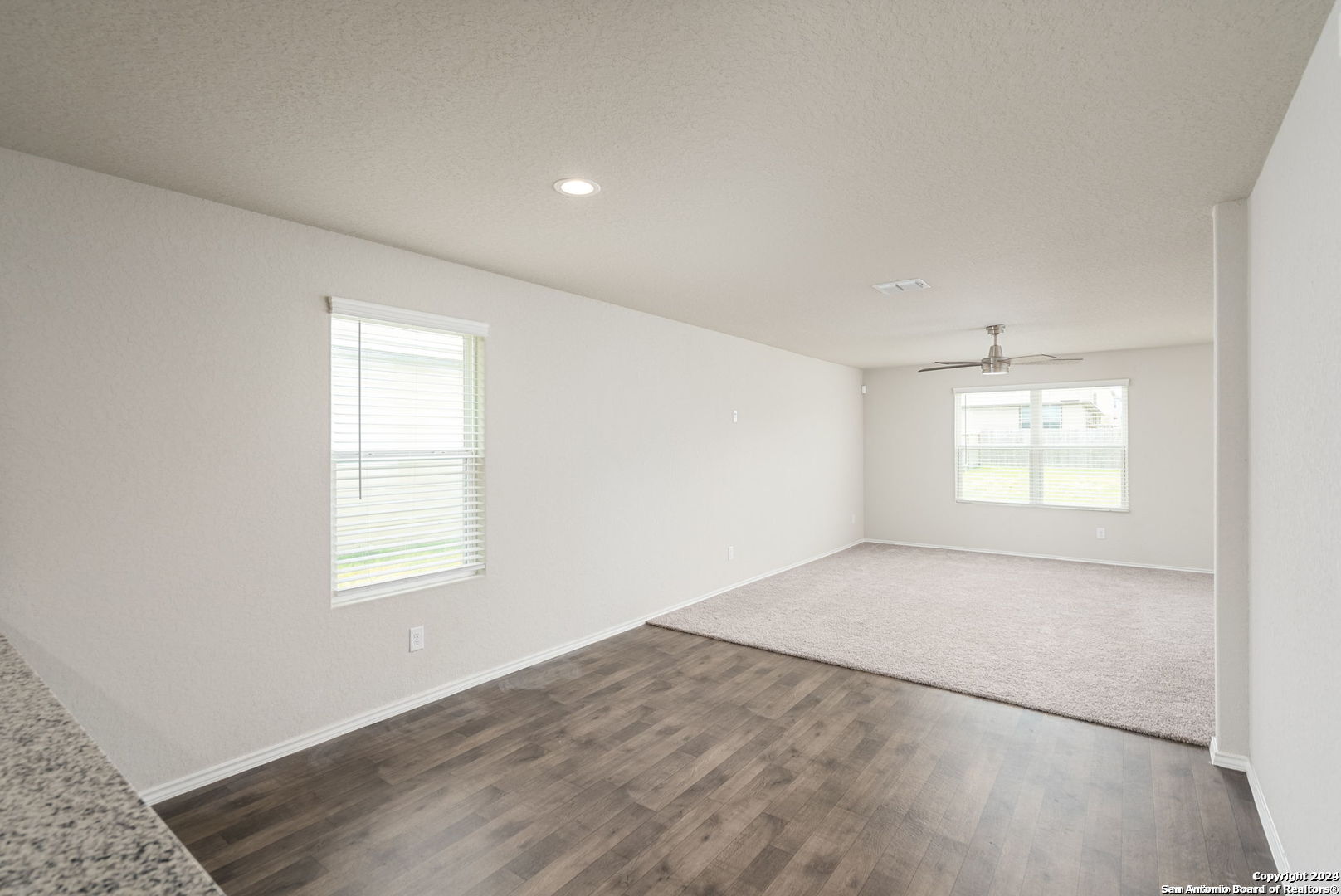 3619 Storm Moon Converse, TX 78109 - Photo 10 of 28 an empty room with windows