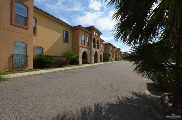 a view of a street with a house