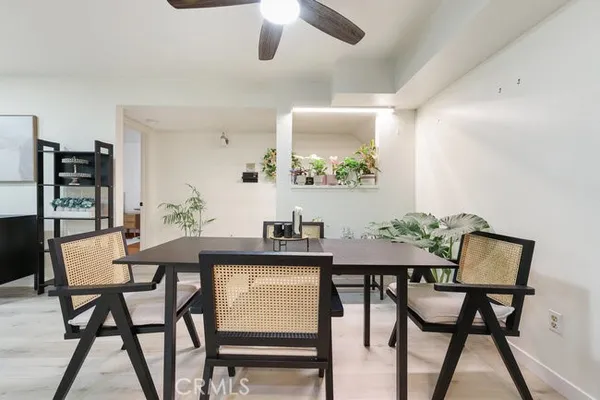 a view of a table and chairs in a room