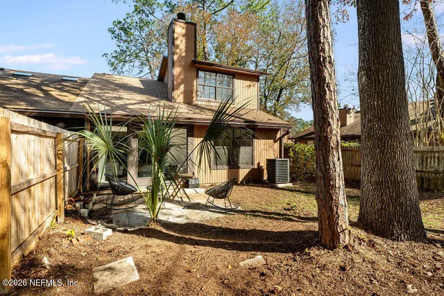 a view of a house with snow on the wall