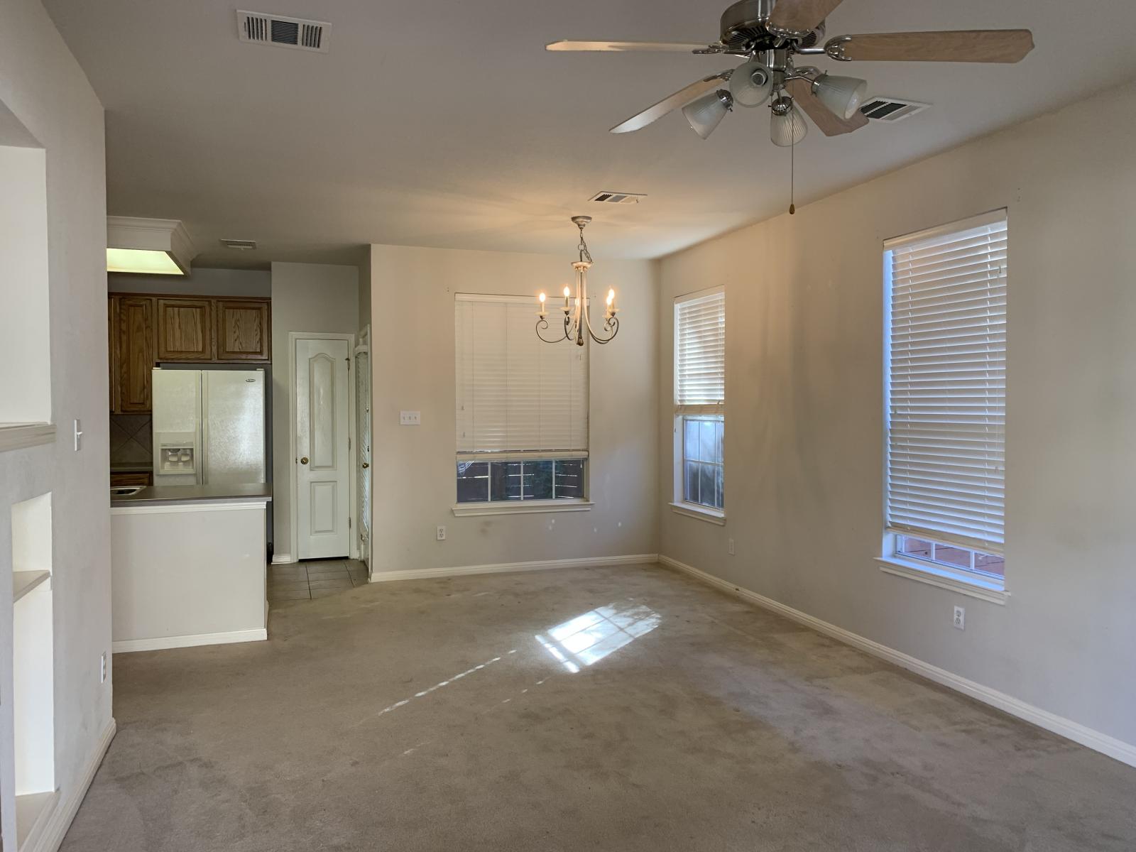 11000 Anderson Mill Road, Unit 29 Austin, TX 78750 - Photo 2 of 27 a view of an empty room with a window