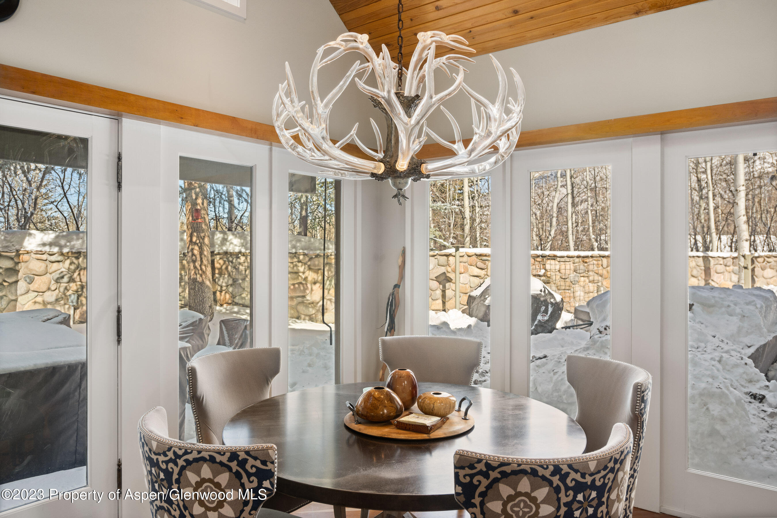 1402 Crystal Lake Road Aspen, CO 81611 - Photo 4 of 22 a outdoor living space with furniture and a potted plant