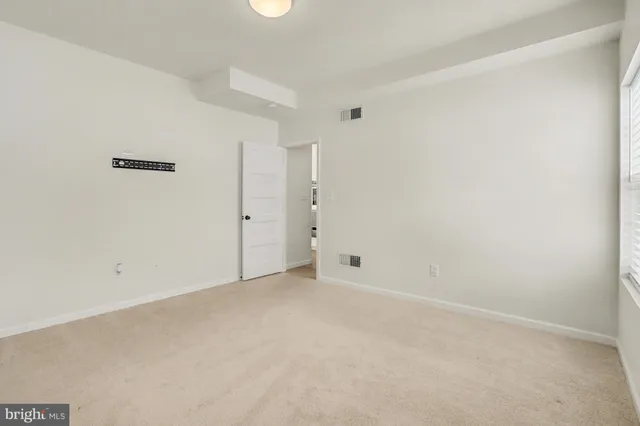 an empty room with an entryway