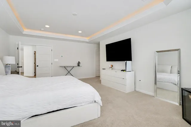 a room with furniture and flat screen tv