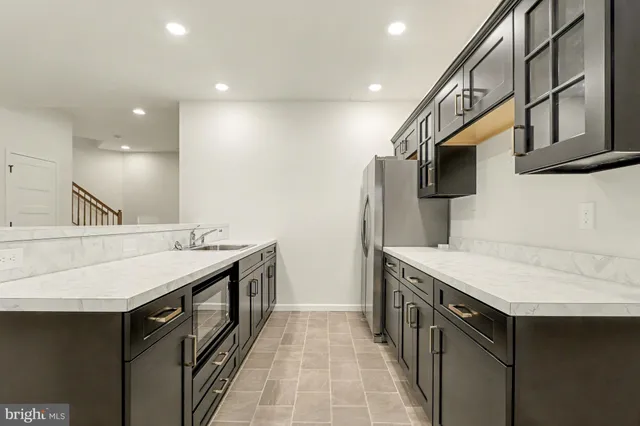 a view of a kitchen with a sink