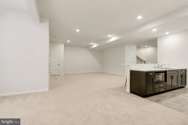 a view of a room with an empty space