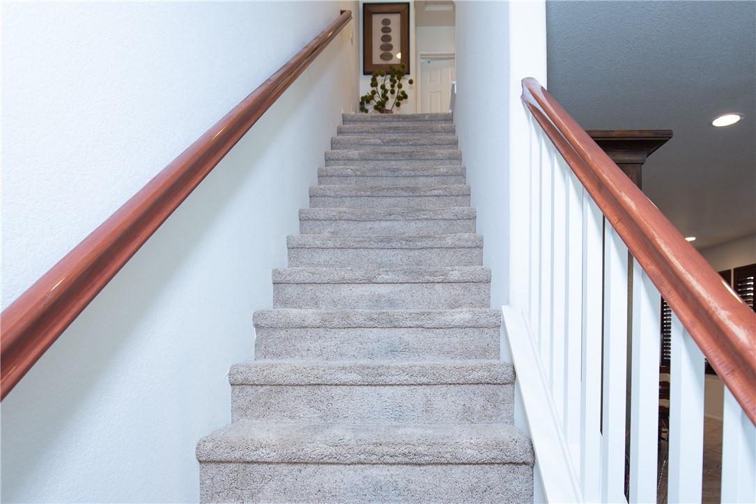 7353 Ellena W, Unit 52 Rancho Cucamonga, CA 91730 - Photo 14 of 30 Upstairs are all three bedrooms along with the laundry area.