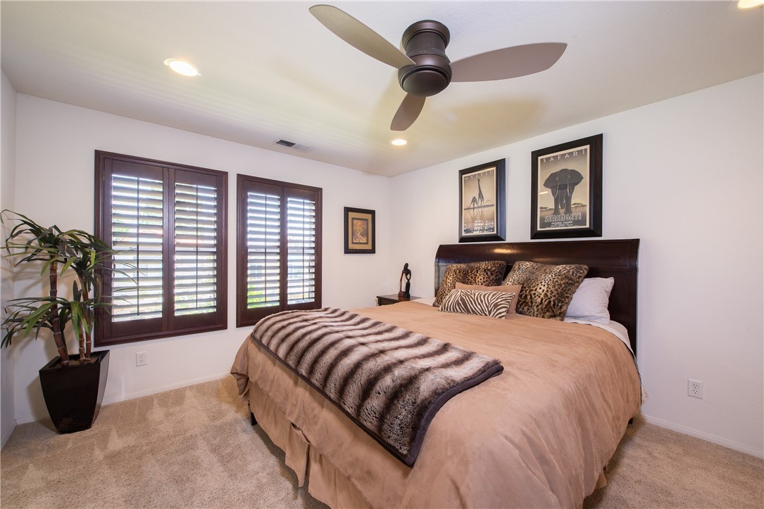 7353 Ellena W, Unit 52 Rancho Cucamonga, CA 91730 - Photo 15 of 30 The roomy primary suite is perfectly placed in the back of the condo.