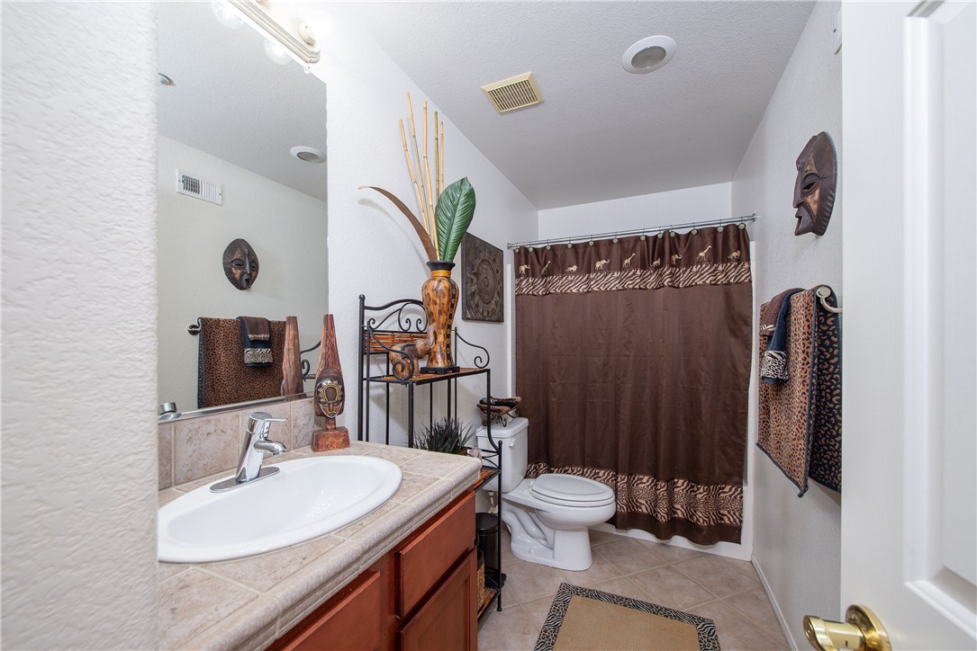 7353 Ellena W, Unit 52 Rancho Cucamonga, CA 91730 - Photo 22 of 30 The upstairs bathroom is perfeclty placed and has a bathtub/shower combination.