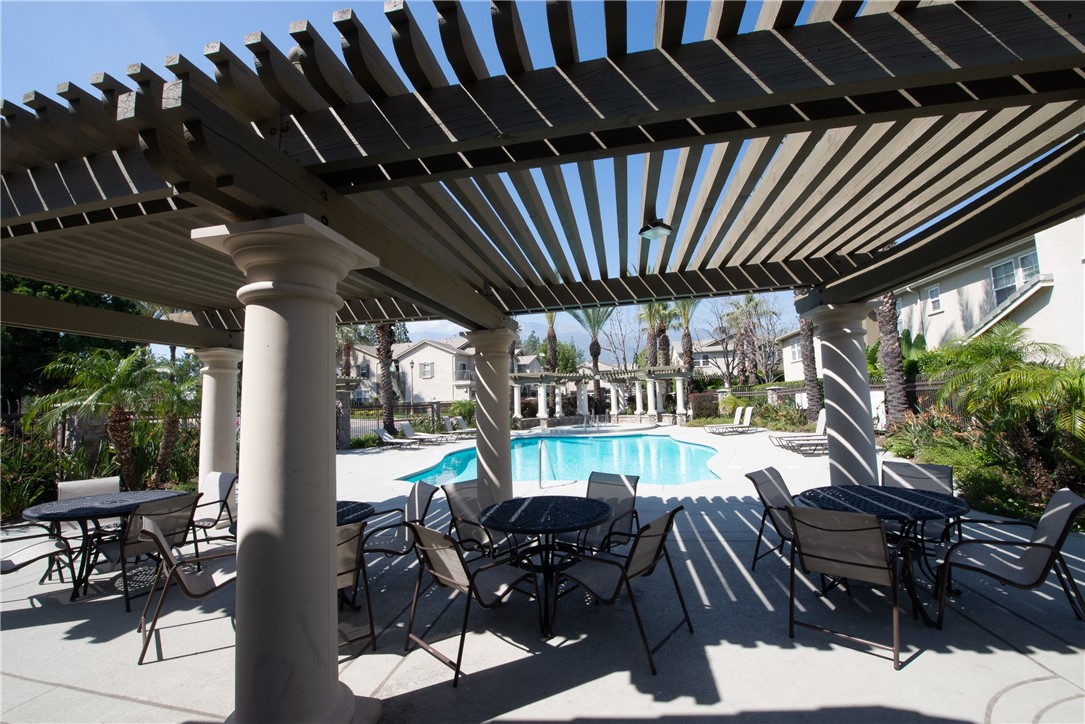 7353 Ellena W, Unit 52 Rancho Cucamonga, CA 91730 - Photo 28 of 30 There is plenty of seating on the patio next to the pool.