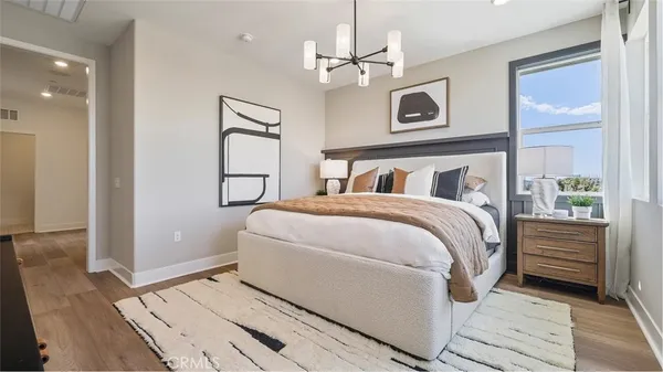 a bed room with a bed and a window