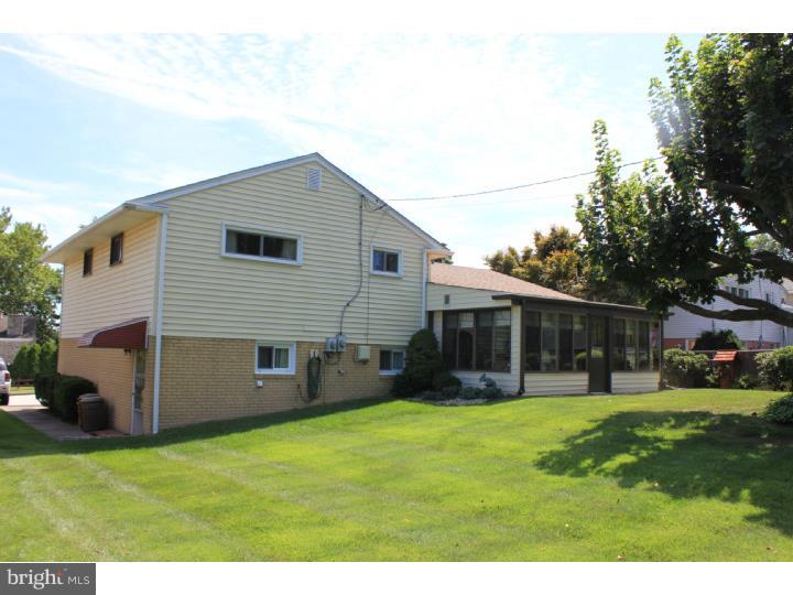 118 Harned Road Springfield, PA 19064 - Photo 2 of 25 a view of a house with a backyard