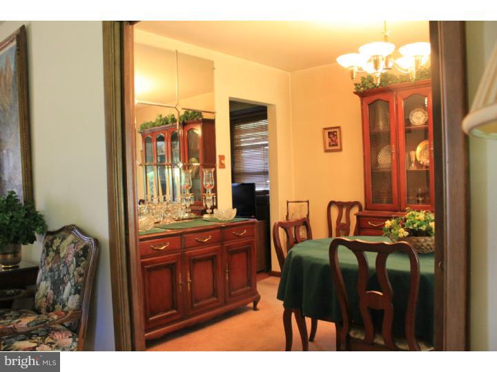 118 Harned Road Springfield, PA 19064 - Photo 12 of 25 a view of a dining room with furniture and chandelier