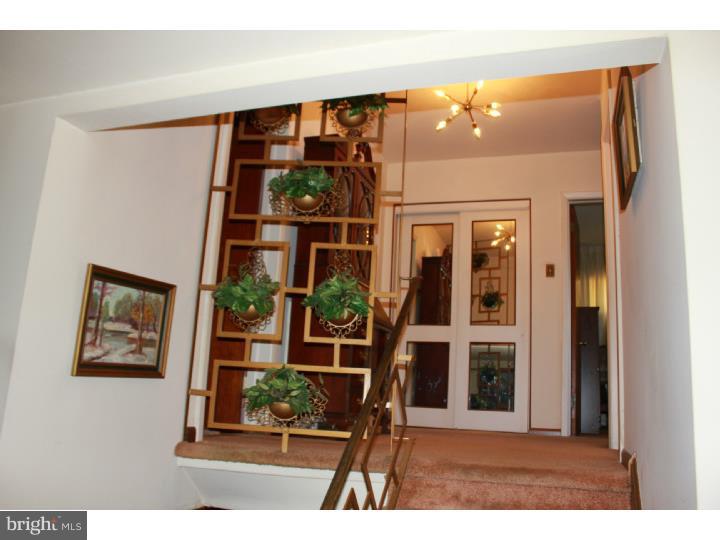 118 Harned Road Springfield, PA 19064 - Photo 13 of 25 a view of entryway and hall with wooden floor