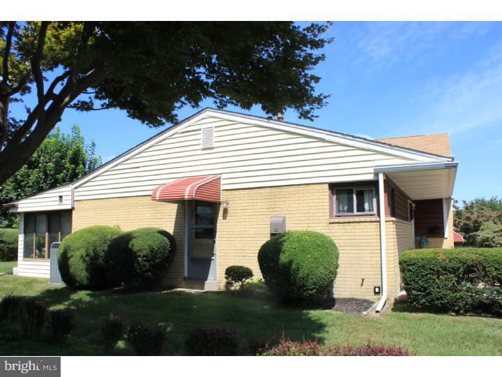 118 Harned Road Springfield, PA 19064 - Photo 3 of 25 a view of a house with backyard and a garden