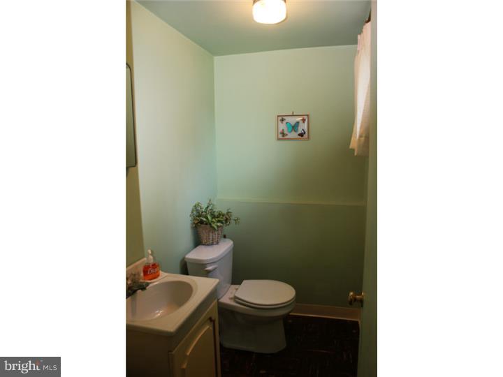 118 Harned Road Springfield, PA 19064 - Photo 24 of 25 a bathroom with a toilet and a sink