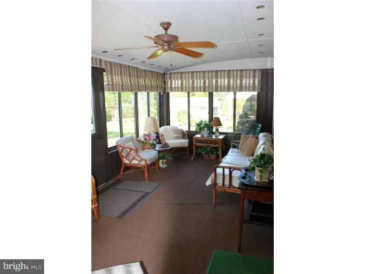 118 Harned Road Springfield, PA 19064 - Photo 25 of 25 a living room with furniture and a large window
