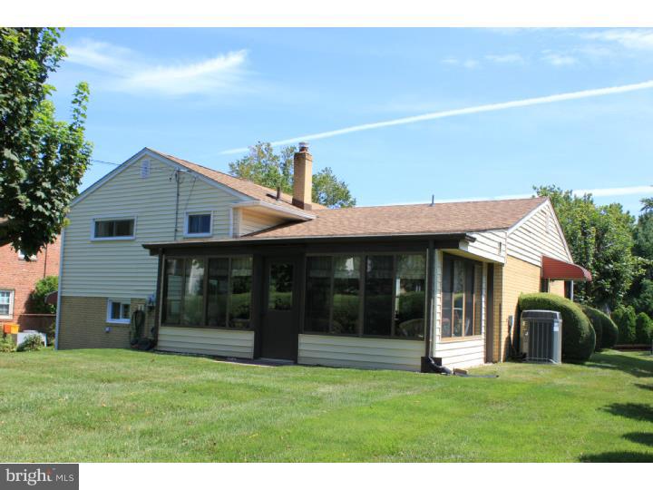 118 Harned Road Springfield, PA 19064 - Photo 4 of 25 a front view of a house with a yard