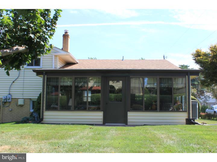 118 Harned Road Springfield, PA 19064 - Photo 6 of 25 a front view of a house with a yard