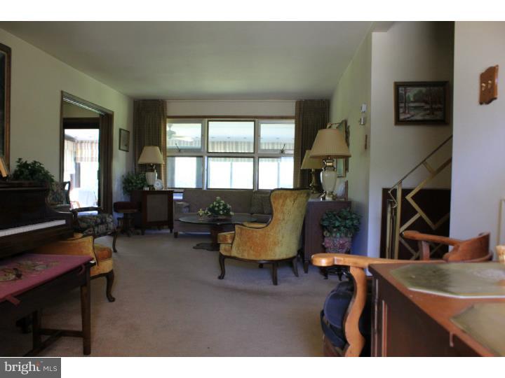118 Harned Road Springfield, PA 19064 - Photo 9 of 25 a living room with furniture and a window