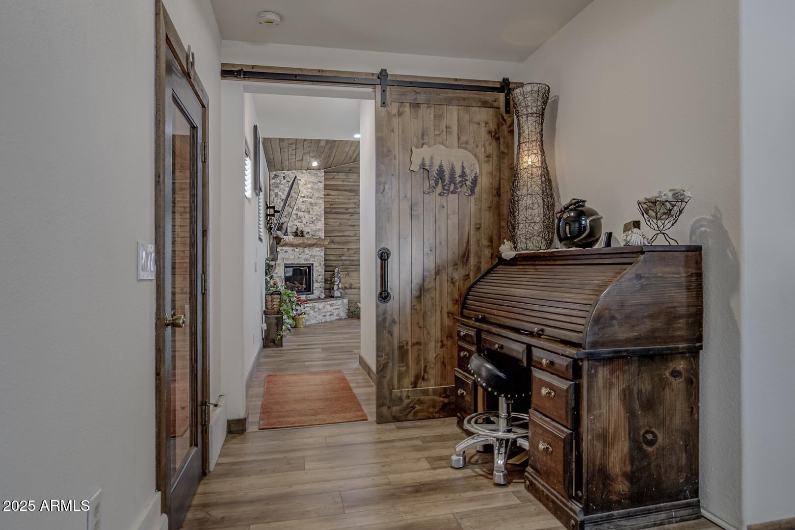 1103 East Ranch Road Payson, AZ 85541 - Photo 16 of 74 a view of a livingroom with wooden floor and stairs