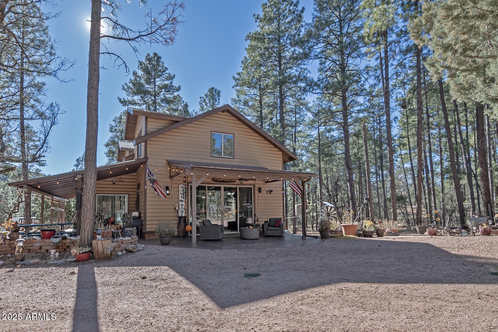 1103 East Ranch Road Payson, AZ 85541 - Photo 44 of 74 a front view of a house with a yard