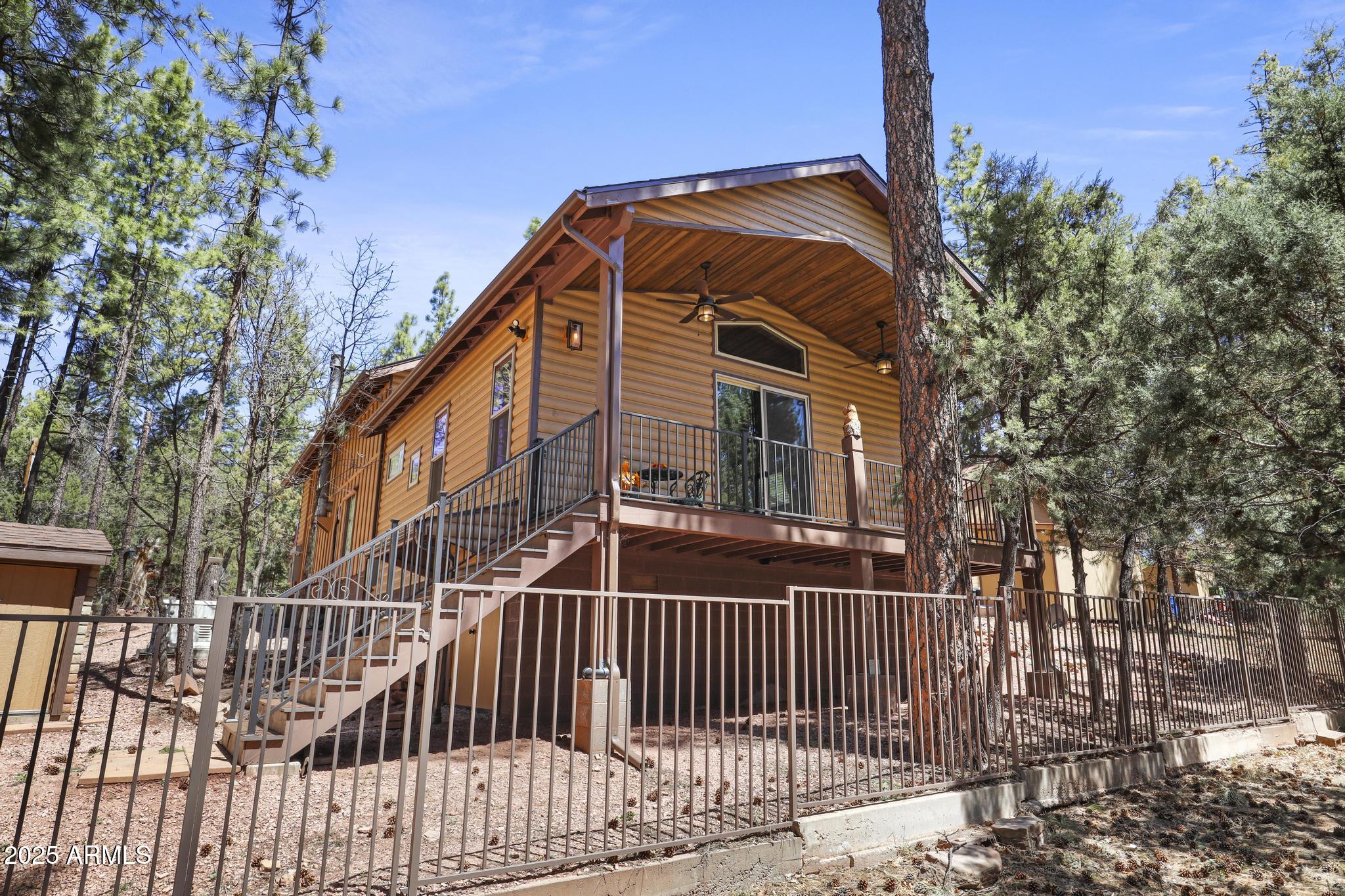 1103 East Ranch Road Payson, AZ 85541 - Photo 66 of 74 a view of a house with a small yard