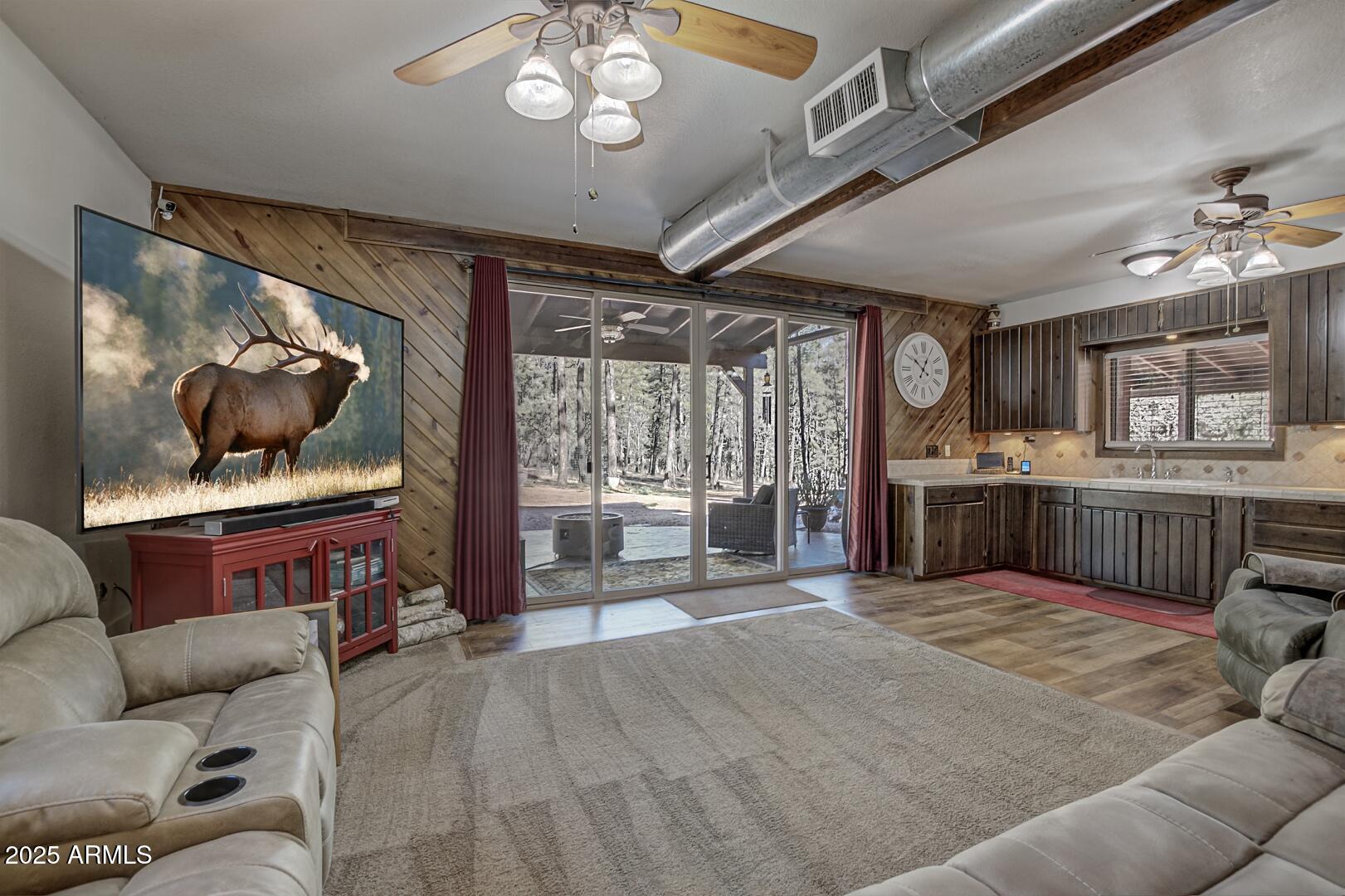1103 East Ranch Road Payson, AZ 85541 - Photo 8 of 74 a living room with furniture and a flat screen tv