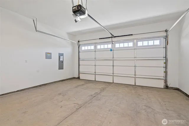 a room with painting and a table