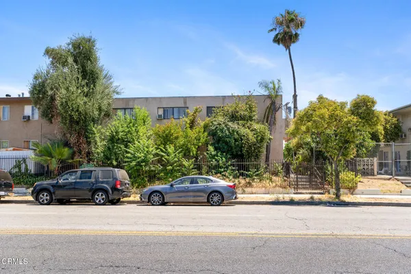 a car parked in front of a house