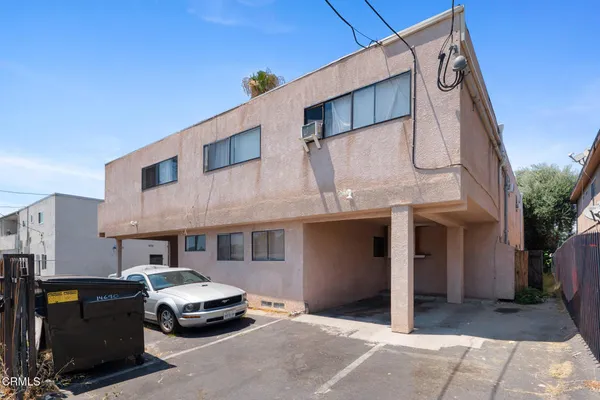 a car parked in front of a building