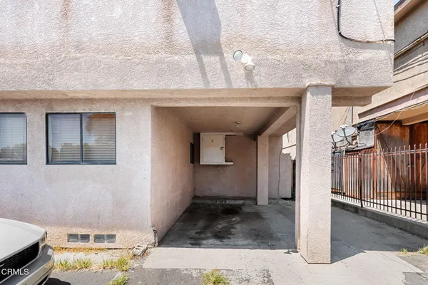 a view of street with parked cars