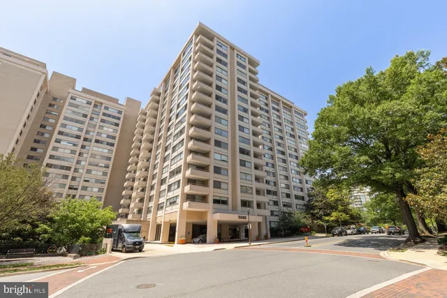 a view of a swimming pool and an outdoor space