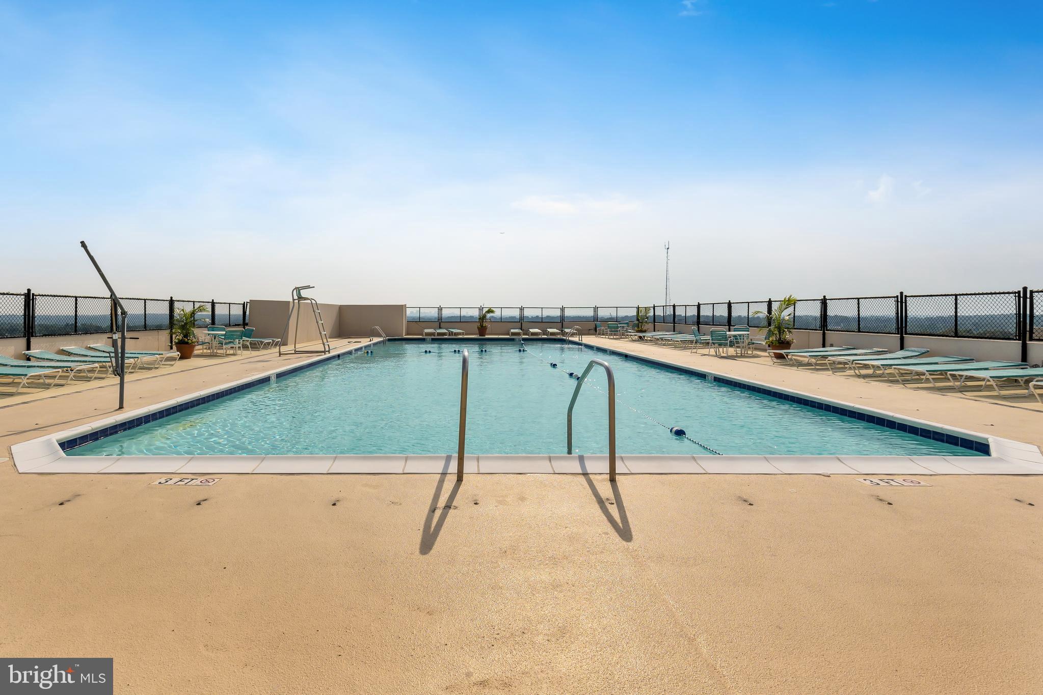 5500 Friendship Boulevard, Unit 910N Chevy Chase, MD 20815 - Photo 16 of 17 a view of a swimming pool and an outdoor space