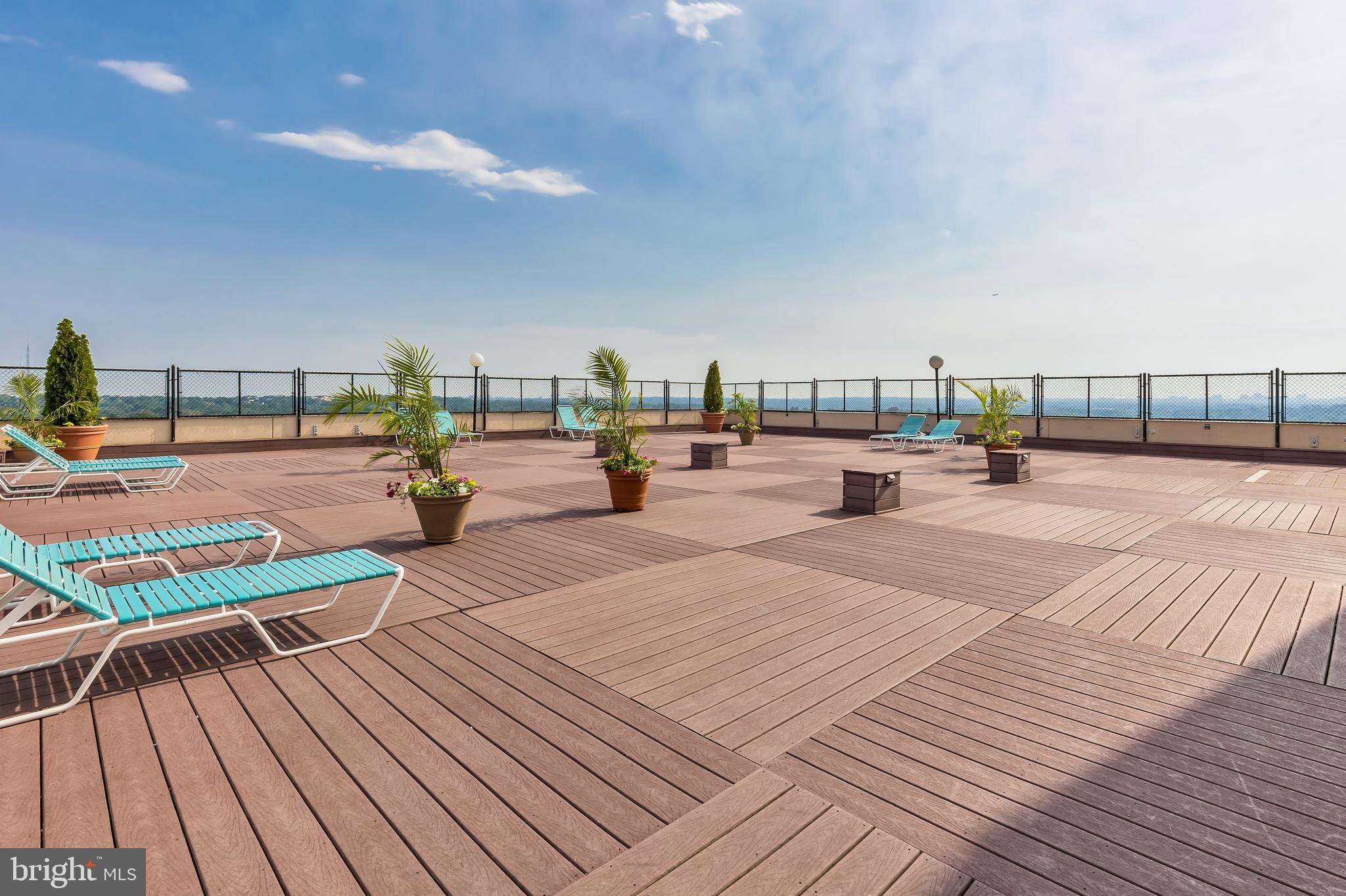 5500 Friendship Boulevard, Unit 910N Chevy Chase, MD 20815 - Photo 17 of 17 a view of a terrace with wooden floor