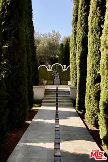 a view of a garden with patio