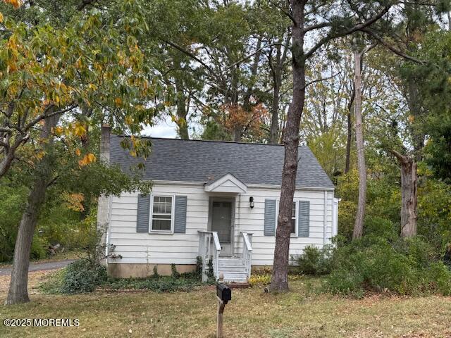139 Walnut Drive Brick, NJ 08724 - Photo 15 of 15 a front view of a house with garden
