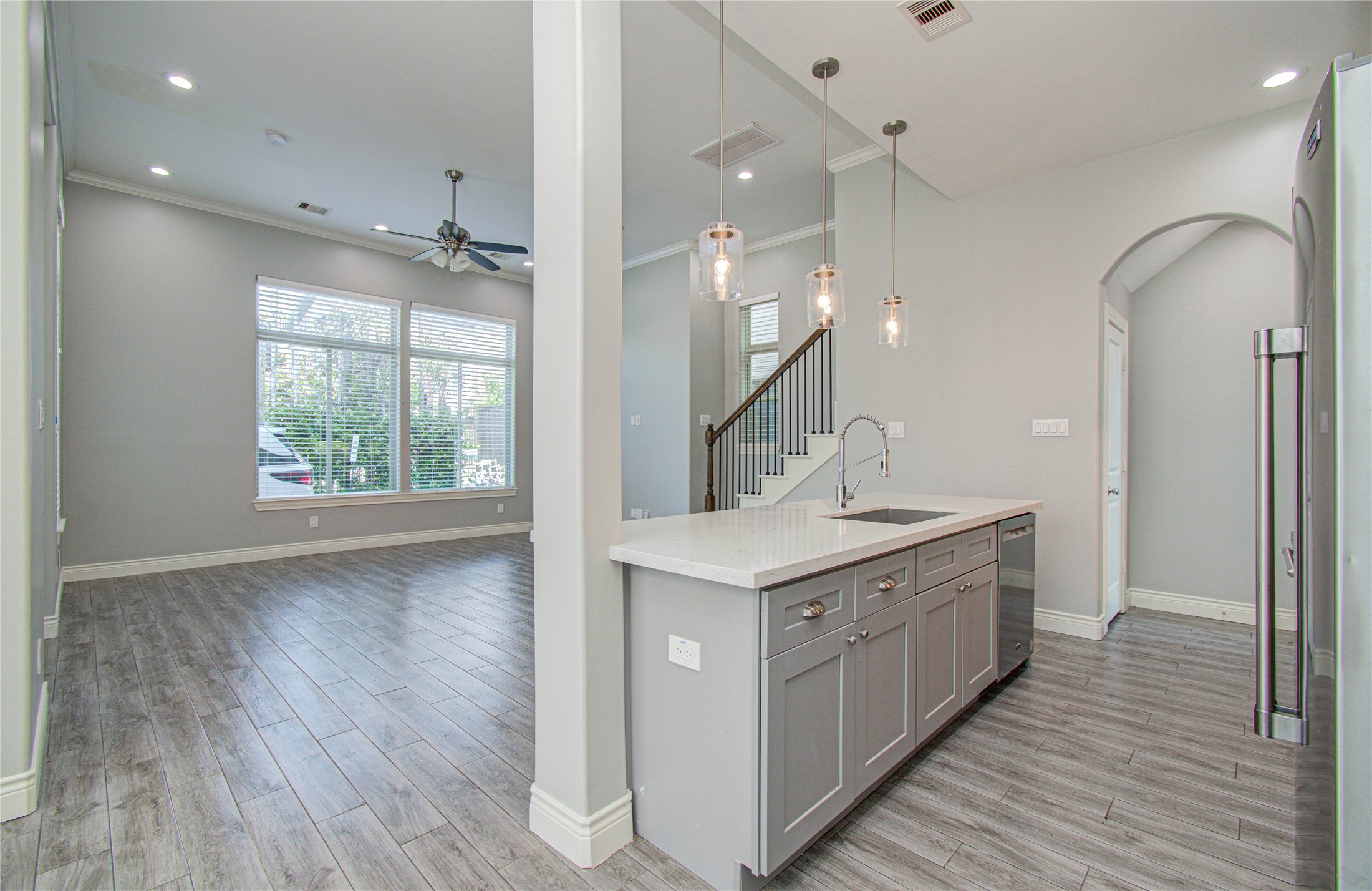 8903 Spring Knoll Forest Drive Houston, TX 77080 - Photo 20 of 29 a large kitchen with a large counter top a sink stainless steel appliances and cabinets