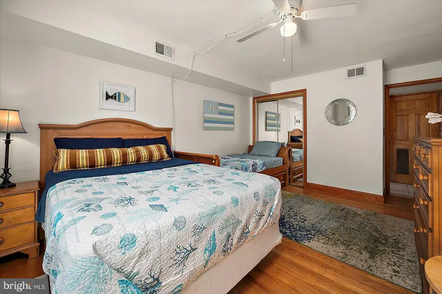 a view of a chairs and table in the balcony