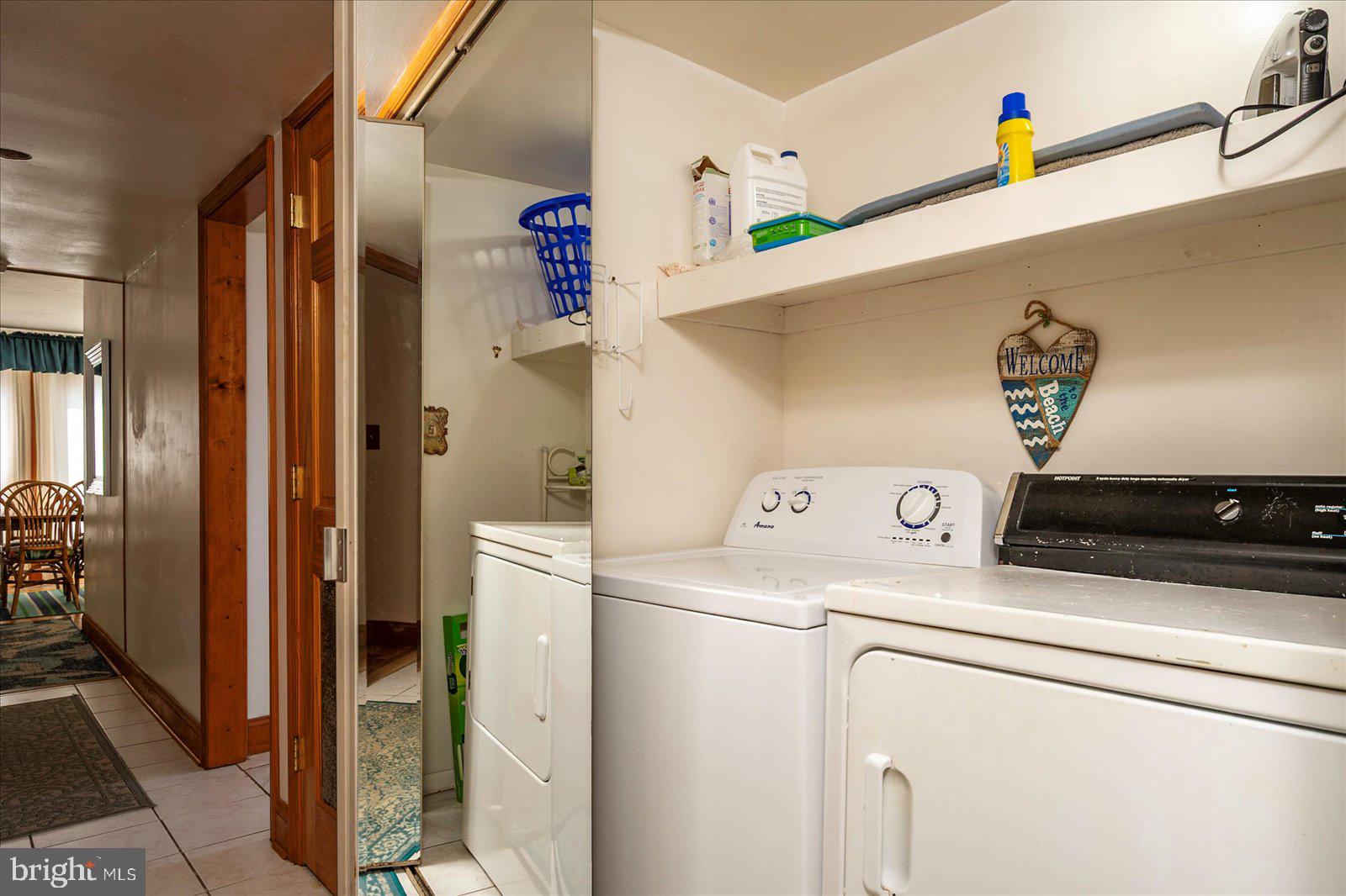 11602 Coastal Highway, Unit 1A Ocean City, MD 21842 - Photo 40 of 83 a utility room with dryer and washer