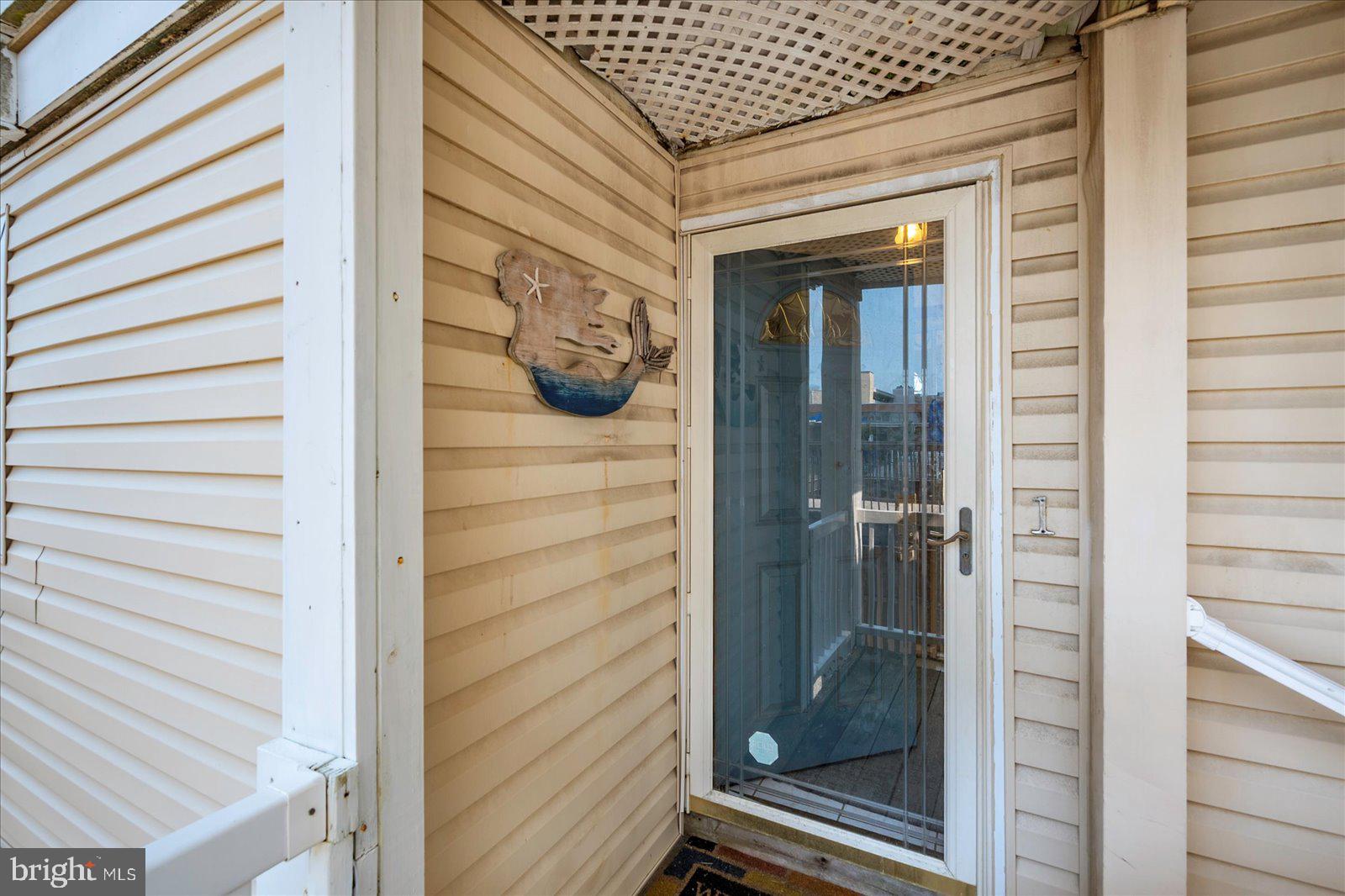 11602 Coastal Highway, Unit 1A Ocean City, MD 21842 - Photo 5 of 83 a view of a door and a window