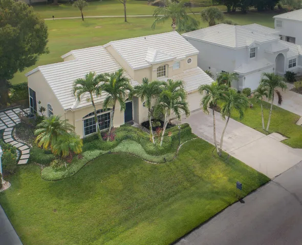 an aerial view of a house with a garden