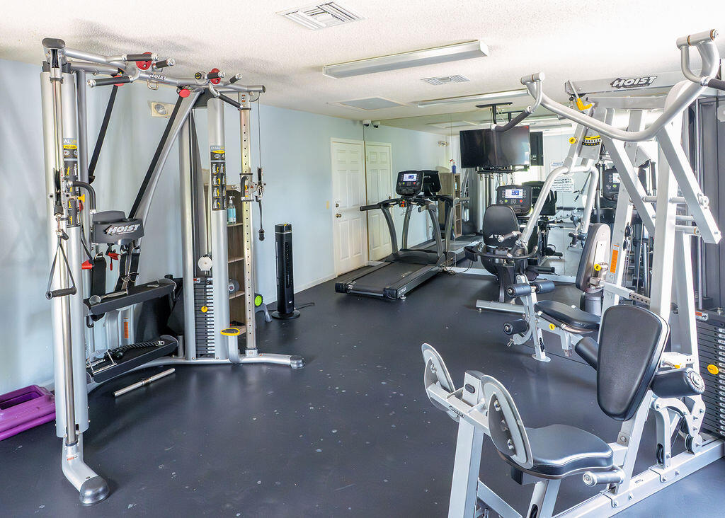18157 Southeast Fairview Circle Jupiter, FL 33469 - Photo 17 of 27 a view of a room with gym equipment