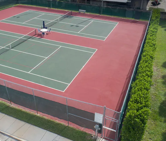 a tennis court that has tennis net