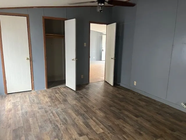 a view of a livingroom with wooden floor