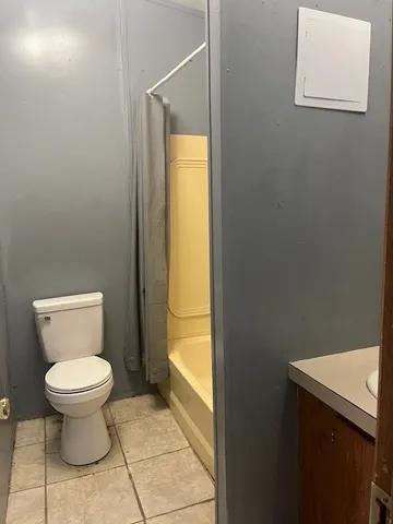 a bathroom with a toilet