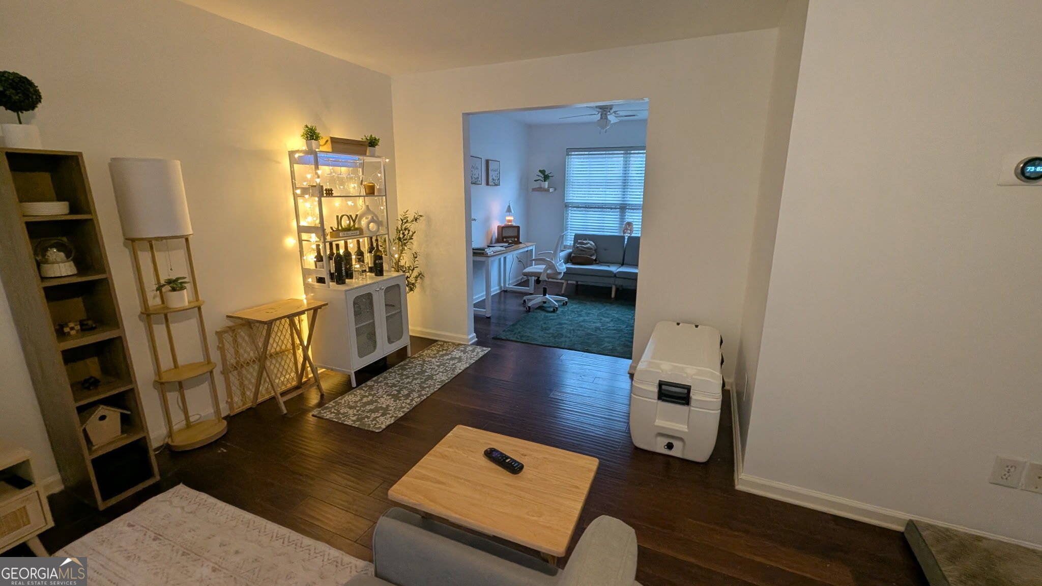 48 Highlander Trail Southwest Rome, GA 30165 - Photo 11 of 45 a living room with furniture and a book shelf