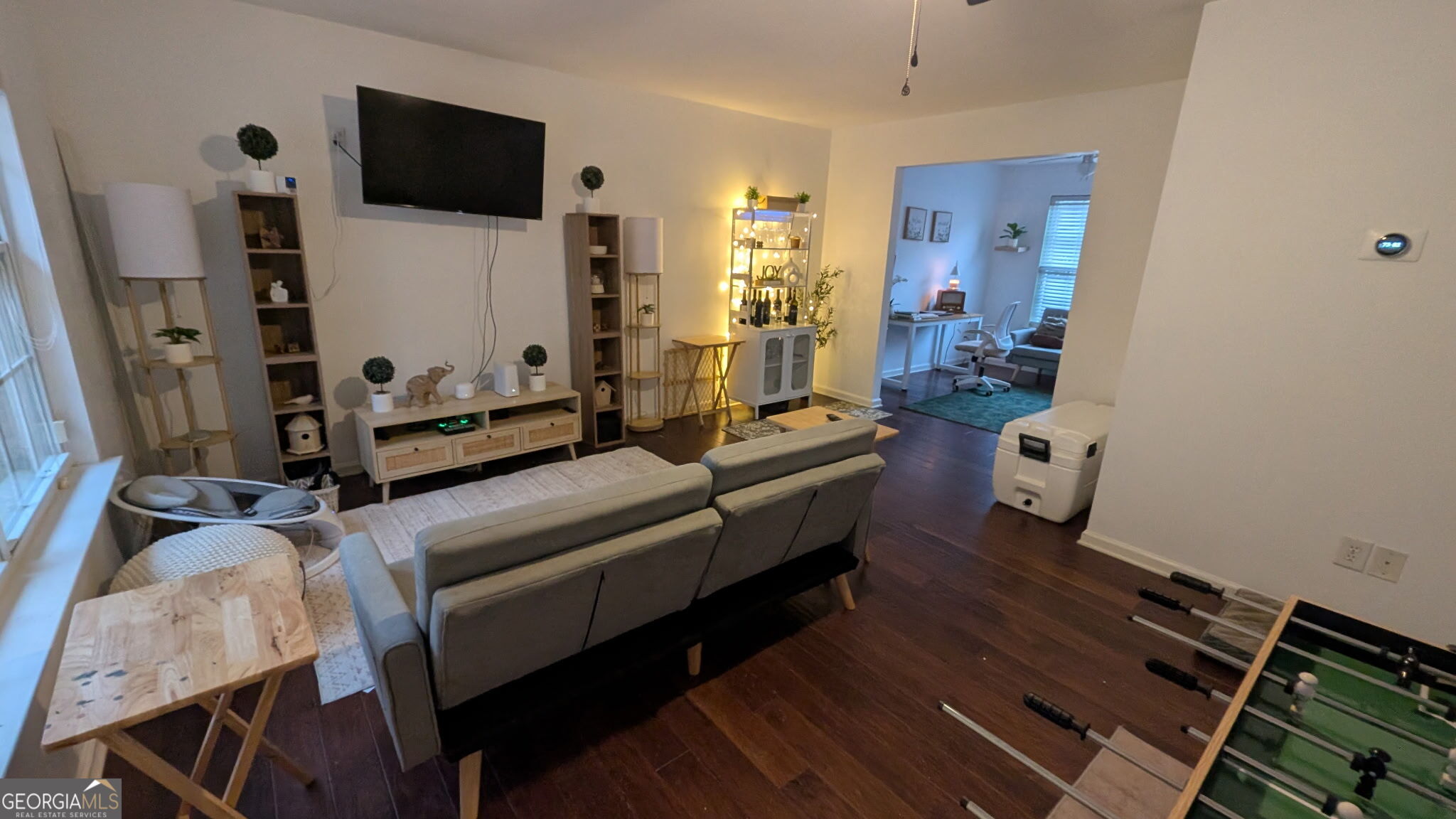 48 Highlander Trail Southwest Rome, GA 30165 - Photo 13 of 45 a living room with furniture and a flat screen tv