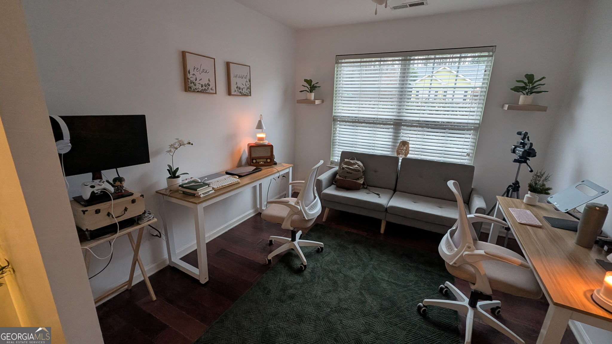 48 Highlander Trail Southwest Rome, GA 30165 - Photo 34 of 45 a living room with furniture a flat screen tv and a window
